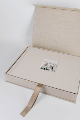 wedding book with small photo of the couple and beige genuine leather